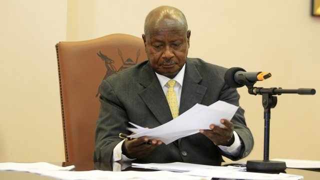 Ugandan President Yoweri Museveni signs anti-gay bill