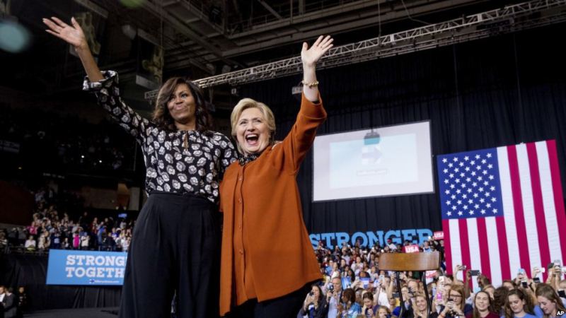 Clinton, Michelle Obama Share Presidential Campaign Stage for First Time