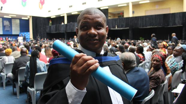 SOUTH AFRICA: BLIND FATHER, ORNETTE DANSE, GRADUATES WITH DISTINCTION