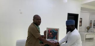 L-R: Prince Sam Ogrih CEO, DMTL, receiving the award from Hon. Haruna Kwanem, Vice President, Northern Youth Council of Nigeria